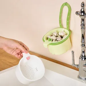 Hanging sink strainer basket, kitchen garbage drain basket with press-to-dump design.