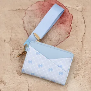 Blue plaid leather card holder with wrist strap, cute bow print and zipper coin purse detail.