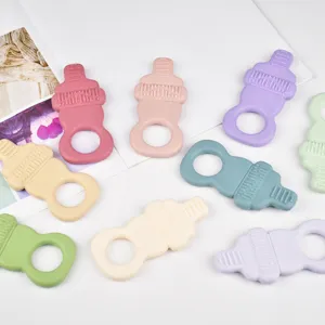 Silicone baby teether set, bottle shaped soothing teething toys in assorted pastel colors for infant.