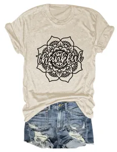 Casual retro women's short sleeve t-shirt with thankful floral print and denim shorts outfit.