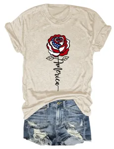 Close-up detail of the American flag rose print and cursive America text on casual tee.