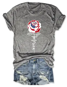 Details of women's patriotic American flag rose graphic short sleeve t-shirt with denim shorts.