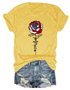 Detailed view of the yellow short sleeve t-shirt featuring a USA flag rose graphic and text.