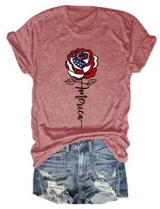 Detailed close-up of a women's patriotic graphic t-shirt featuring a rose and America text.