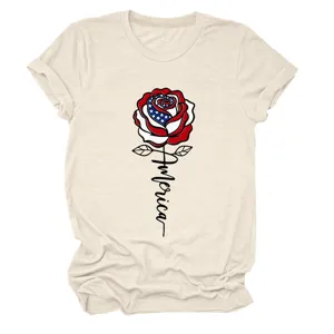 Casual women's beige short sleeve t-shirt featuring a patriotic American flag rose graphic.