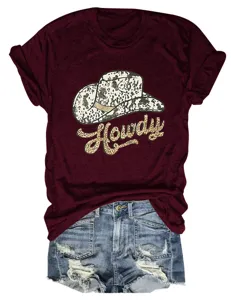 Close-up detail of the maroon graphic tee featuring a stylish Howdy cowboy hat print.