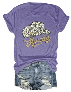 Detail view of casual women's purple t-shirt featuring a western cowboy hat and Howdy print.