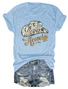 Light blue short sleeve t-shirt with leopard cowboy hat and howdy graphic detail.