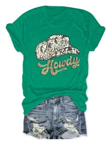 Women green short sleeve t-shirt with howdy leopard cowboy hat print and denim shorts.