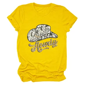 Close up detail of yellow women short sleeve t-shirt featuring graphic print cowgirl hat howdy top.