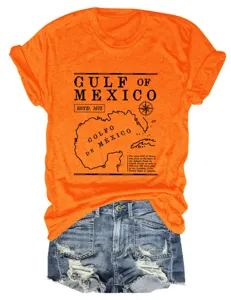 Detailopname van de vintage Golf van Mexico grafische print op het stijlvolle oranje shirt.