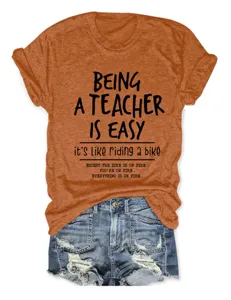 Casual t-shirt a maniche corte arancione con stampa divertente da insegnante per giorni.