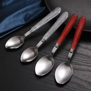 Set di cucchiai in acciaio inossidabile con manico glitterato, elegante posata da tavola.