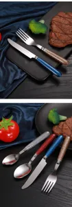 Set di posate in acciaio inox con manici glitterati, coltello da tavola, forchetta e cucchiaio.