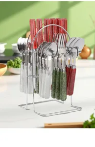 Set di posate in acciaio inossidabile con manici glitterati e supporto incluso.