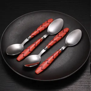 Stainless steel spoons set with red geometric handles elegant tableware for home kitchen dining table