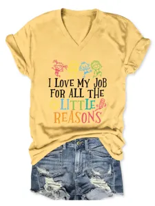 Detail shot of a yellow v-neck short sleeve t-shirt with a cute teacher slogan print.