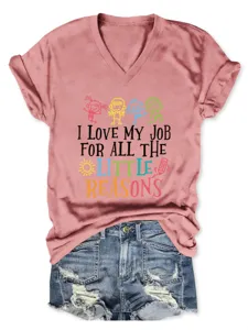 Casual pink V-neck short sleeve t-shirt with fun graphic print and paired with denim shorts.