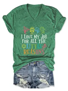 Detailed view of a stylish green heather V-neck short sleeve tee with cute graphic print.