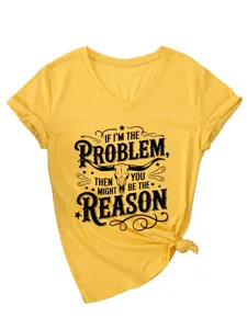 Detail view of yellow V-neck short sleeve t-shirt with rolled cuffs and graphic print.