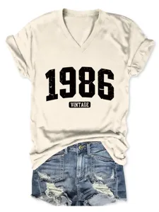Maglietta casual con scollo a V e maniche corta da donna, top vintage 1986 elegante.