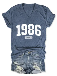 Maglietta donna scollo V manica corta blu melange con stampa vintage 1986 casual.