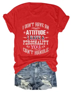 Detail shot of women's casual short sleeve t-shirt with text print and denim shorts.