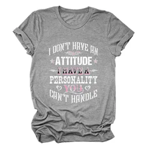 Close-up detail of women grey short sleeve t-shirt featuring stylish motivational text print.