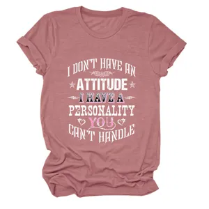 Close-up detail of the stylish casual women's short-sleeve graphic t-shirt in dusty pink.