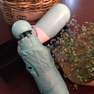 Mini Kapsel Regenschirm Sonnenschutz, kompakter UV Schutz Taschensonnenschirm tragbar.