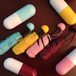 Kompakter Kapsel-Sonnenschirm mit Etui, UV-Schutz, leichter und tragbarer Taschenschirm.
