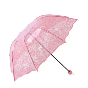 Pink lace transparent folding umbrella with heart pattern, cute Korean style windproof gear.