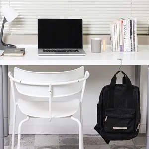 Portable desk hook for school bag and office use, sturdy edge hanging hook for backpack storage.
