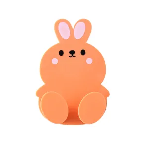 Cute cartoon rabbit plug wall hook, punch-free silicone socket holder for home organization.