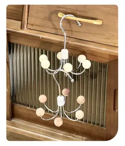 360-degree rotatable multi-claw wardrobe hook for neat closet organization and bag storage.