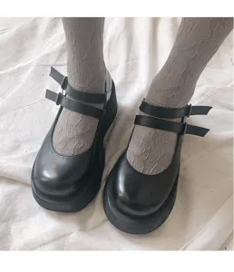 Sweet black platform Mary Jane shoes paired with floral lace socks for cute daily fashion wear.