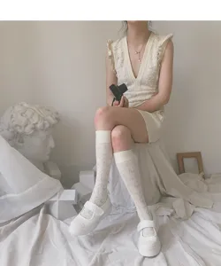 Sweet lace calf socks for women, featuring delicate floral patterns and soft fabric.