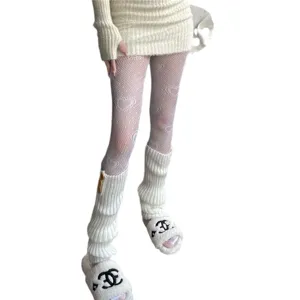 White heart patterned fishnet tights for women, sweet cute lolita style mesh pantyhose.