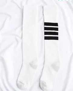 Cotton asymmetric knee high socks, black and white striped athletic tube socks for women