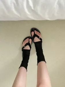 Korean style sheer stirrup leg warmers for women, thin breathable black tulle socks.