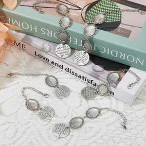 Exquisite silver tone time gemstone tray photo pendant bracelet, detailed jewelry accessory design.