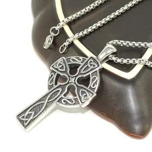 Stainless steel Celtic cross pendant necklace detail view, intricate hollow cutout design.