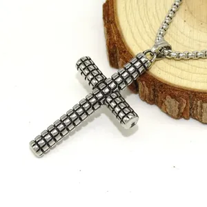 Stainless steel cross pendant necklace with unique grid textured design for men.