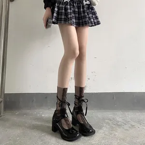 Kurze Netzspartensocken mit schwarzen Schleifen im süßen japanischen JK-Stil für Damen.
