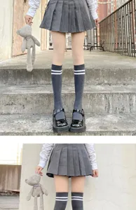 Grey knee high socks with double white stripes, women casual cotton calf socks detail view.
