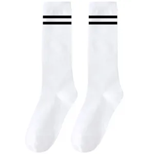Classic white long socks with double black stripes, perfect knee-high varsity style for women.