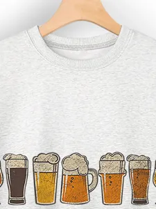 Grey sweatshirt detail featuring fun beer glasses print, casual long sleeve crewneck top for women.