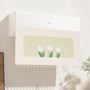 Wall-mounted AC wind deflector curtain with cute tulip print and pom-pom fringe decor.
