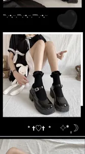 Black frilly Lolita short socks paired with Mary Jane shoes for sweet Japanese style outfit.
