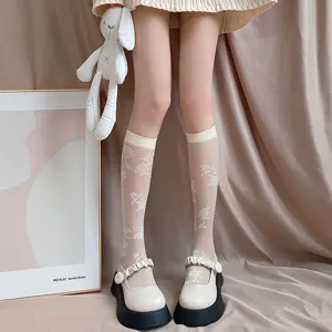 Sheer knee high socks for women with thin rose pattern and retro platform shoes style